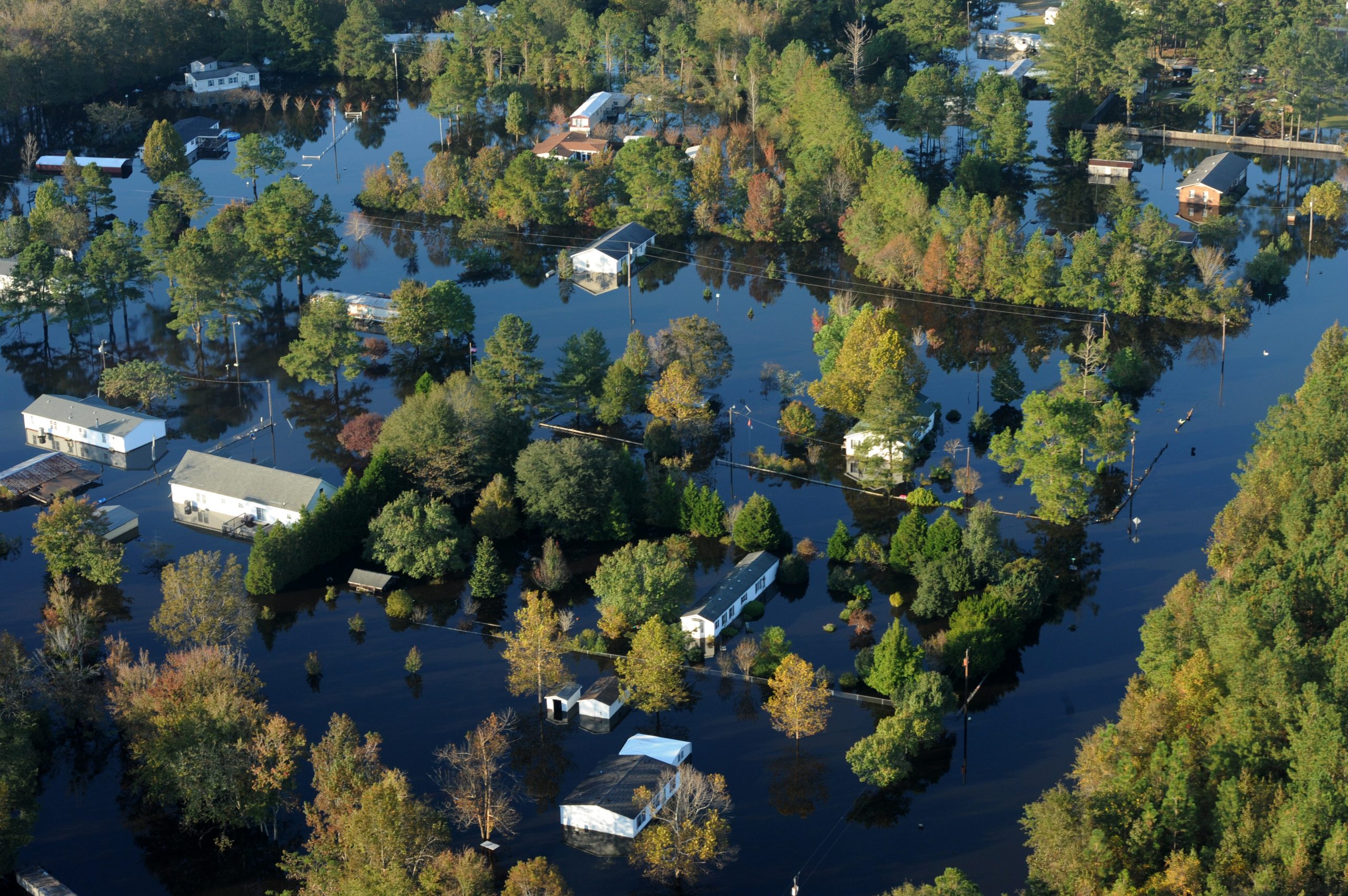 Floodwaters from Hurricane Matthew (2016) surround many houses in Craven County, N.C. Photo by Jocelyn Augustino/FEMA.